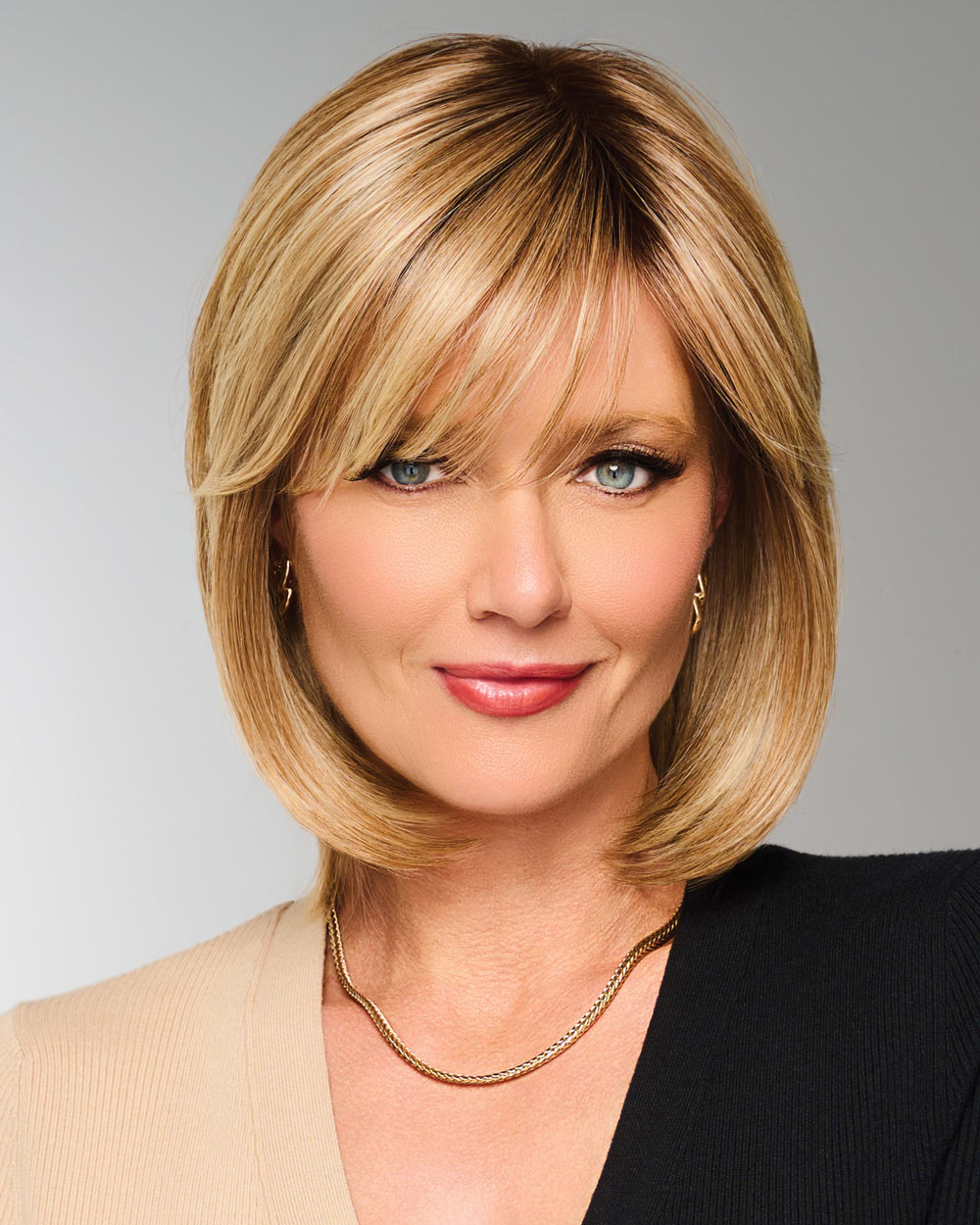 Timeless Charm | Monofilament Part Synthetic Wig by Raquel Welch